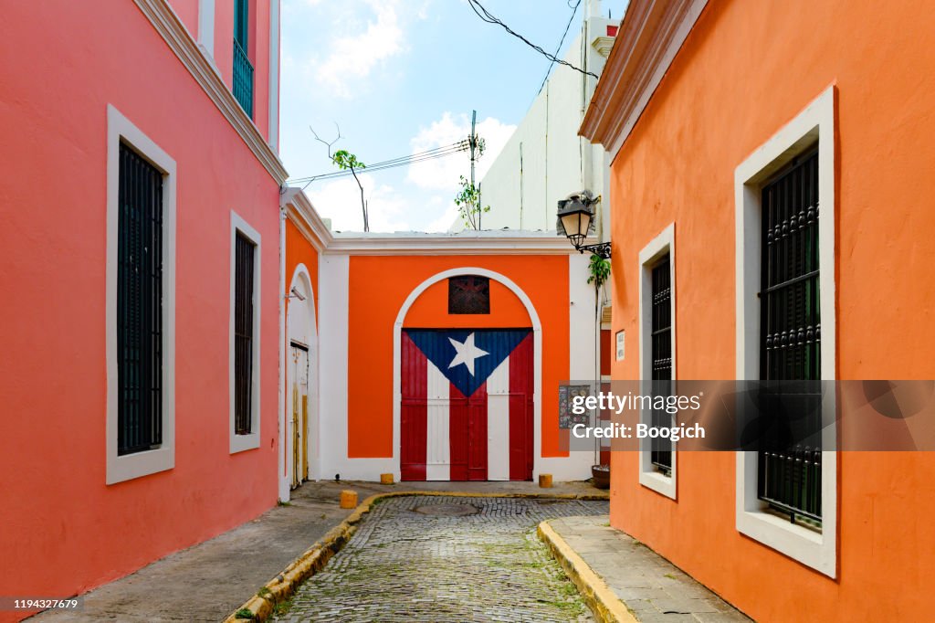 Colorful Buildings with Puerto Rican Flag on Imperial Street in Old San Juan