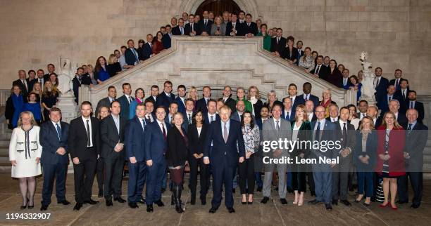 Prime Minister Boris Johnson poses with newly-elected Conservative MPs at the Houses of Parliament on December 16, 2019 in London, England. Boris...