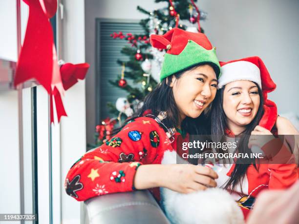 millennial christmas party - funny snow globe stock pictures, royalty-free photos & images