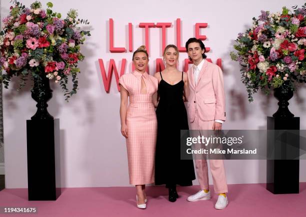 Florence Pugh, Saoirse Ronan and Timothee Chalamet during the "Little Women" photocall at Soho Hotel on December 16, 2019 in London, England.