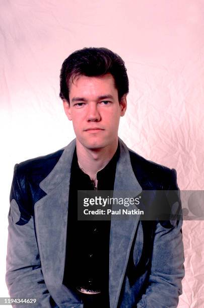 Portrait of American Country musician Randy Travis as he poses backstage at the Poplar Creek Music Theater, Hoffman Estates, Illinois, May 24,1987.
