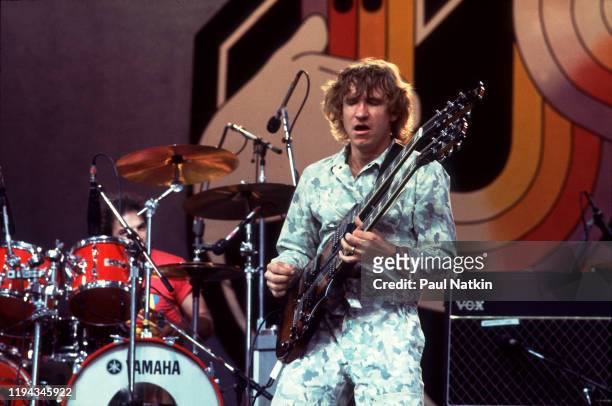 American Rock musician Joe Walsh plays guitar as he performs onstage at the US Festival, Ontario, California, May 30, 1983.