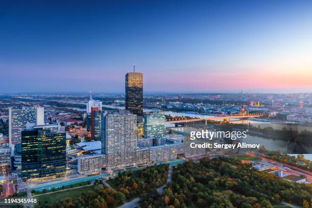 kaisermühlen business downtown aerial view at dusk, vienna - austria skyline stock pictures, royalty-free photos & images