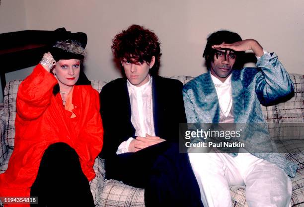 Portrait of members of the English New Wave group Thompson Twins as they pose backstage at the Poplar Creek Music Theater, Hoffman Estates, Illinois,...