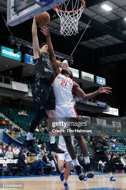 Yudai Baba of the Texas Legends is fouled by Tyler Roberson of the Agua Caliente Clippers during the fourth quarter on January 14, 2020 at Comerica...