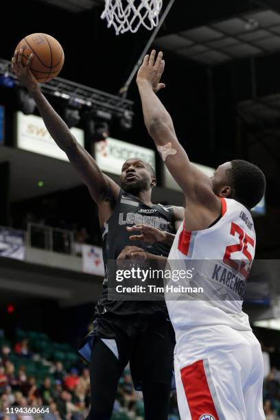 Trahson Burrell of the Texas Legends drives on Mfiondu-Kabengele of the Agua Caliente Clippers during the fourth quarter on January 14, 2020 at...