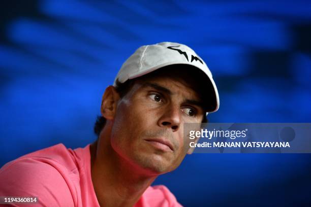 Spain's Rafael Nadal speaks at a press conference ahead of the Australia Open tennis tournament in Melbourne on January 18, 2020. - --IMAGE...