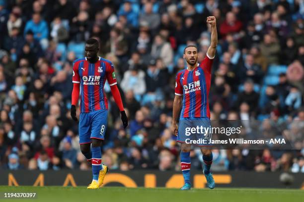 Cenk Tosun of Crystal Palace celebrates after scoring a goal to make it 0-1 during the Premier League match between Manchester City and Crystal...