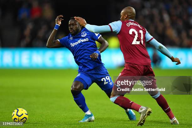 Our Niasse of Everton competes with Angelo Ogbonna of West Ham United during the Premier League match between West Ham United and Everton FC at...