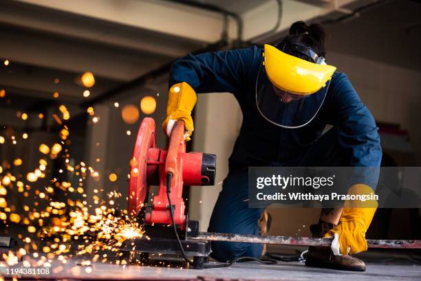 worker with the grinder - metal sanding stock pictures, royalty-free photos & images