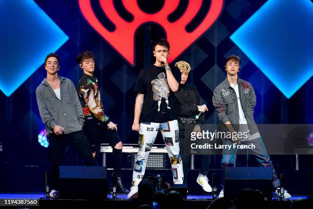 Daniel Seavey, Zach Herron, Jonah Marais, Jack Avery, and Corbyn Besson of Why Don't We perform onstage during HOT 99.5's Jingle Ball 2019 on...