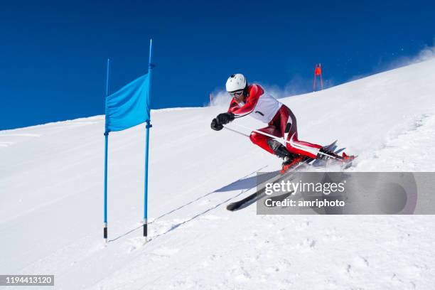 professional winter sports, athlete man during alpine super g skiing training - professional skier stock pictures, royalty-free photos & images