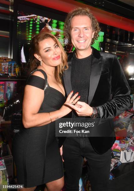 Nicolas Mereau and actress Miss Amal Maizou attend Hopital Necker Children XMas Party at VIP Room Theater on December 16, 2019 in Paris, France.