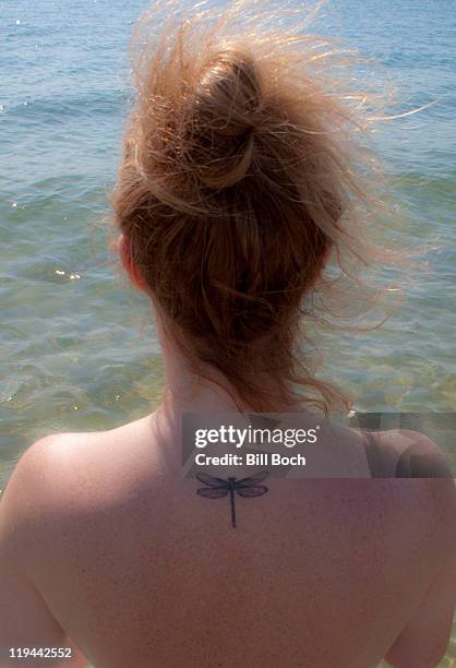 girl with dragon tattoo - dragonfly-line-drawing stock pictures, royalty-free photos & images