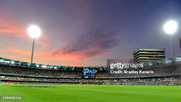 Dusk is seen in this general view of the Gabba during the Big Bash League match between the Brisbane Heat and the Sydney Thunder at The Gabba on...