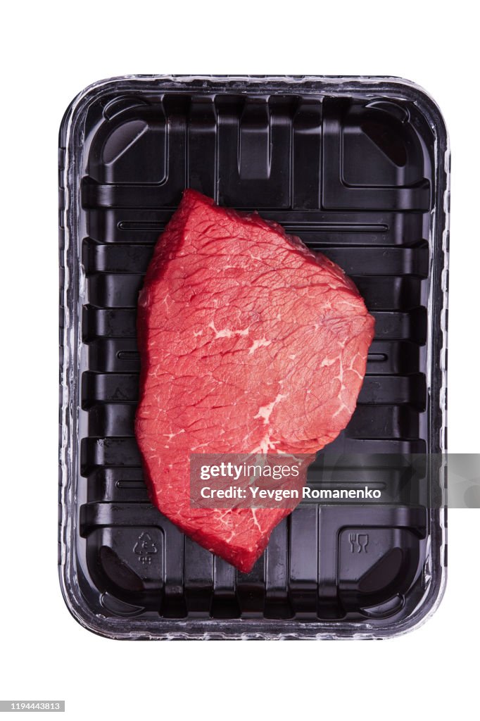 Fresh Raw Meat in package, isolated on white background