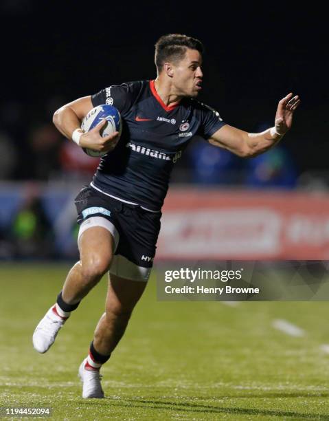 Sean Maitland of Saracens makes a run during the Heineken Champions Cup Round 4 match between Saracens and Munster Rugby at Allianz Park on December...