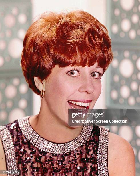 Headshot of Carol Burnett, US actress, singer and dancer, wearing a sequinned top, circa 1970.