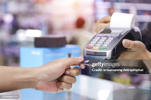 credit card payment, buy and sell products & service - card reader stock pictures, royalty-free photos & images