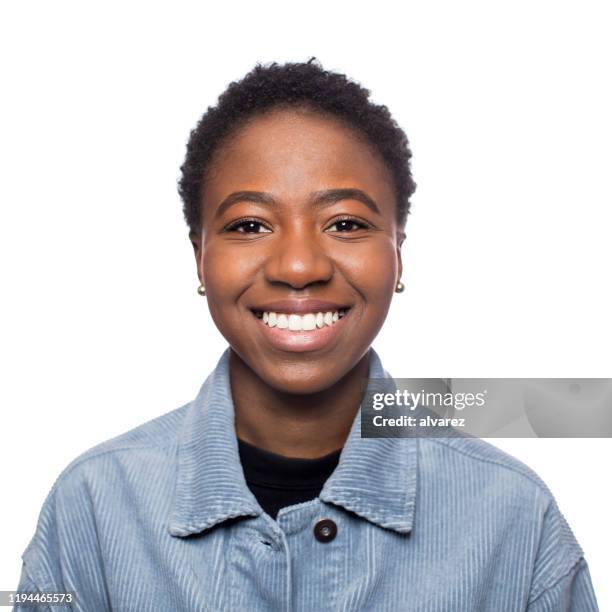 portrait of smiling african american woman - african american young woman portrait white background stock pictures, royalty-free photos & images