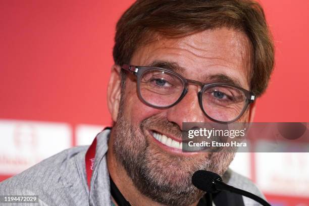 Liverpool manager Juergen Klopp smiles during the pre-match press conference prior to the FIFA Club World Cup Semi-final between Monterrey and...