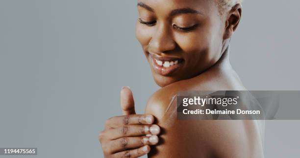 i can't go a day without moisturising - rubbing stock pictures, royalty-free photos & images