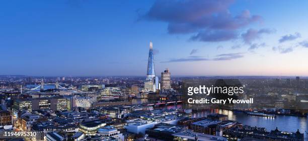 elevated view over london city skyline at dusk - central london stock pictures, royalty-free photos & images