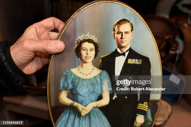 Vintage Queen Elizabeth II coronation souvenir, a biscuit tin, for sale at an antique shop in Santa Fe, New Mexico.