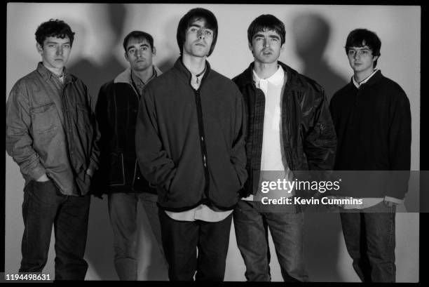 British rock band Oasis, UK, 21st february 1994; they are Tony McCarroll, Paul Arthurs, Liam Gallagher, Noel Gallagher, and Paul McGuigan.