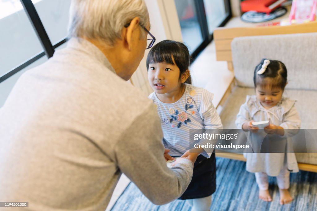 Grandfather giving Otoshidama money