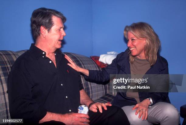 American Rock and Pop musician Brian Wilson and Pop musician and actress Bette Midler talk together backstage at the Roxy Theater, Los Angeles,...