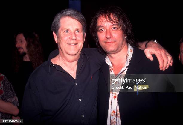 American Rock and Pop musicians Brian Wilson and Peter Buck pose together at the Roxy Theater, Los Angeles California, April 7, 2000.