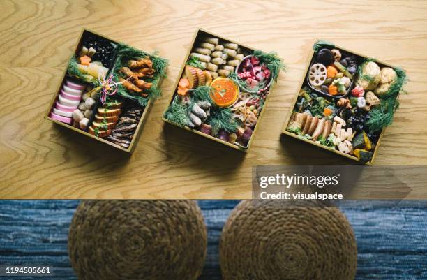 japanese new year's day food osechi ryori - osechi ryori stock pictures, royalty-free photos & images