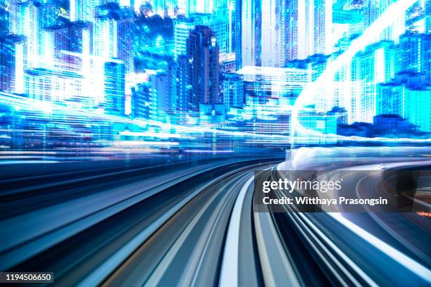 motion speed light tail with night city background - hong kong high speed train stock pictures, royalty-free photos & images