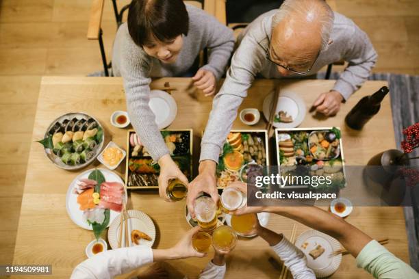 het vieren van new year's day - asian child with new glasses stockfoto's en -beelden