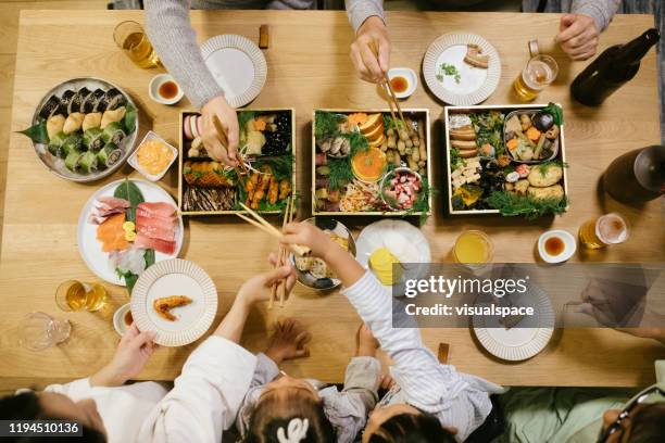 overhead shot of new year' day dinner table - men of the year party inside stock pictures, royalty-free photos & images