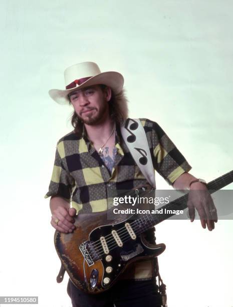 American singer, songwriter and blues-rock guitar great, Stevie Ray Vaughan , poses backstage at the Meadow Brook Music Festival during his "Soul to...