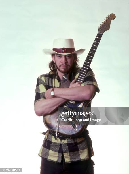 American singer, songwriter and blues-rock guitar great, Stevie Ray Vaughan , poses backstage at the Meadow Brook Music Festival during his "Soul to...