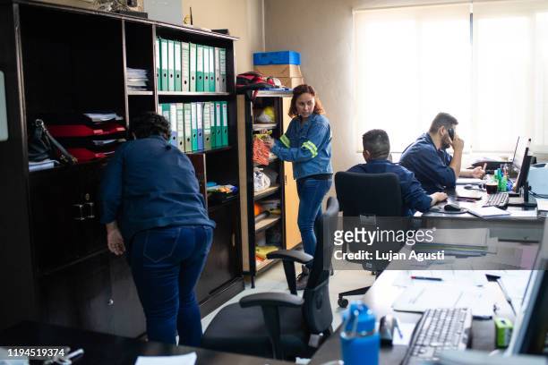 four latin people working - showus office stock pictures, royalty-free photos & images