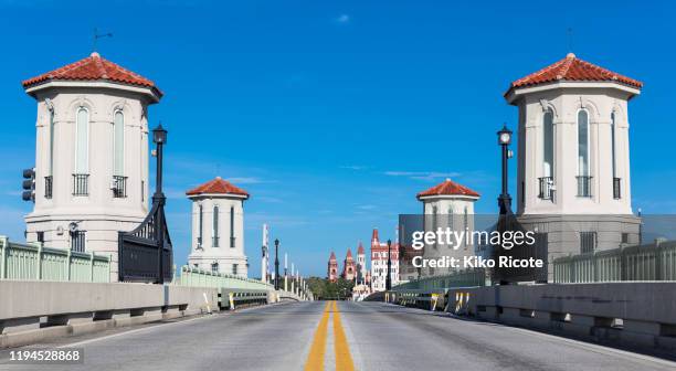 white towers by road in saint augustine, florida, usa - st augustine florida stock pictures, royalty-free photos & images