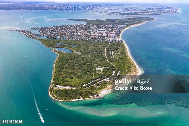 aerial view of peninsula in key biscayne, florida, usa - key biscayne stock pictures, royalty-free photos & images