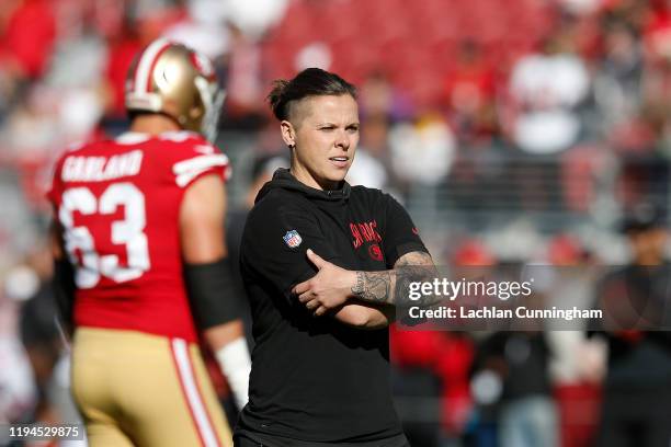 San Francisco 49ers offensive assistant coach Katie Sowers looks on during the warm up before the game against the Atlanta Falcons at Levi's Stadium...
