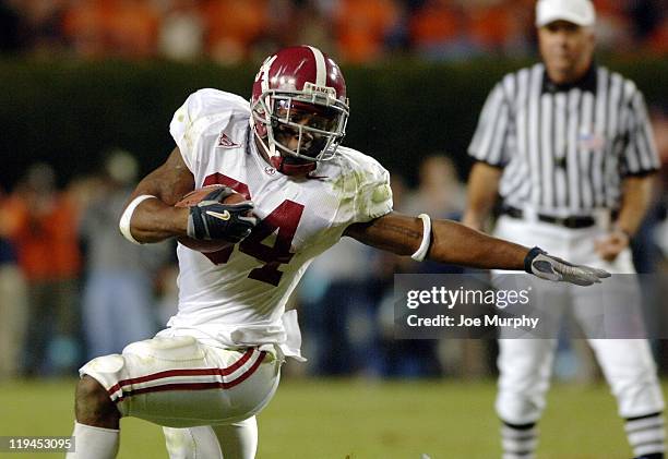 Kenneth Darby runs during second half action. The Auburn Tigers beat the Alabama Crimson Tide 28-18 on November 19, 2005 at Jordan-Hare Stadium in...