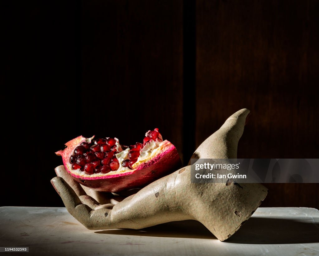 Pomegranate in Mannequin Hand