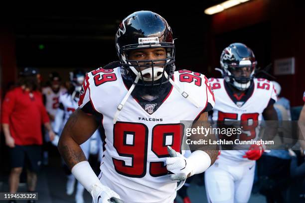 Adrian Clayborn of the Atlanta Falcons runs onto the field for the game against the San Francisco 49ers at Levi's Stadium on December 15, 2019 in...