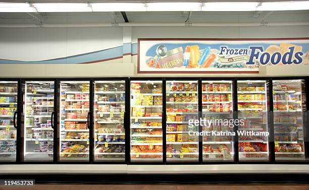 frozen food department of grocery store. - cibi surgelati foto e immagini stock