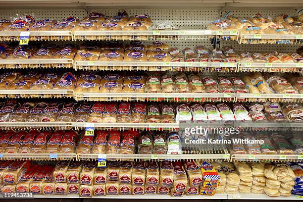 bread aisle of grocery store. - bread bildbanksfoton och bilder