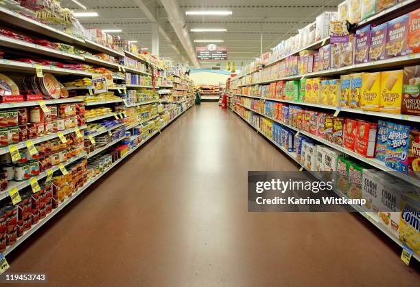 grocery store aisle. - stormarknad bildbanksfoton och bilder