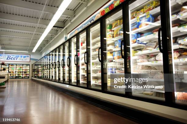 frozen department of grocery store. - supermarket fridge stock pictures, royalty-free photos & images