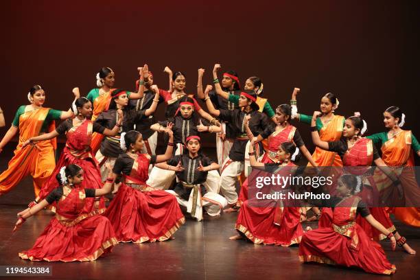 Tamil Bharatnatyam dancers perform a traditional dance depicting the strength of the Goddess Amman during a cultural program celebrating the Thai...